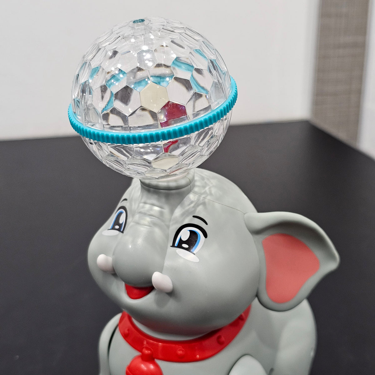 Cute Elephant 360° Rotating Toy – Musical & Light Fun for Kids