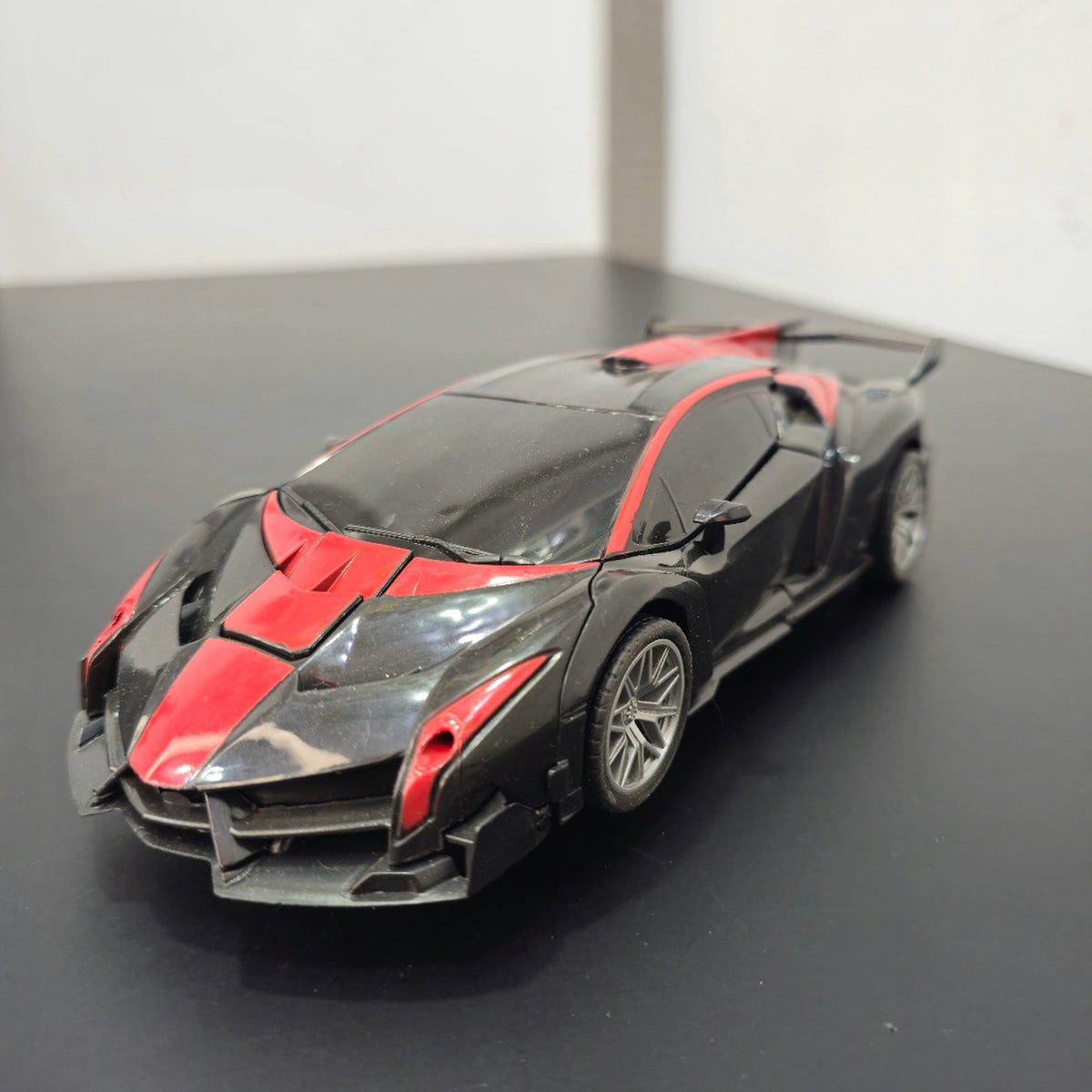 1:18 Scale Power Remote Control Robot Car – Light & Deformation Action