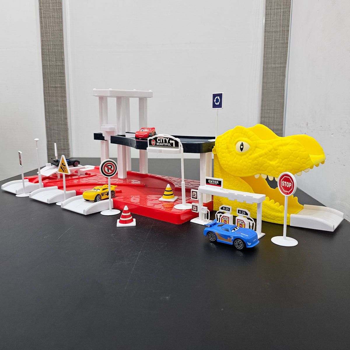 Driven to Win – Cars Parking Lot Playset with 4 Cars, Gas Station & Service Station