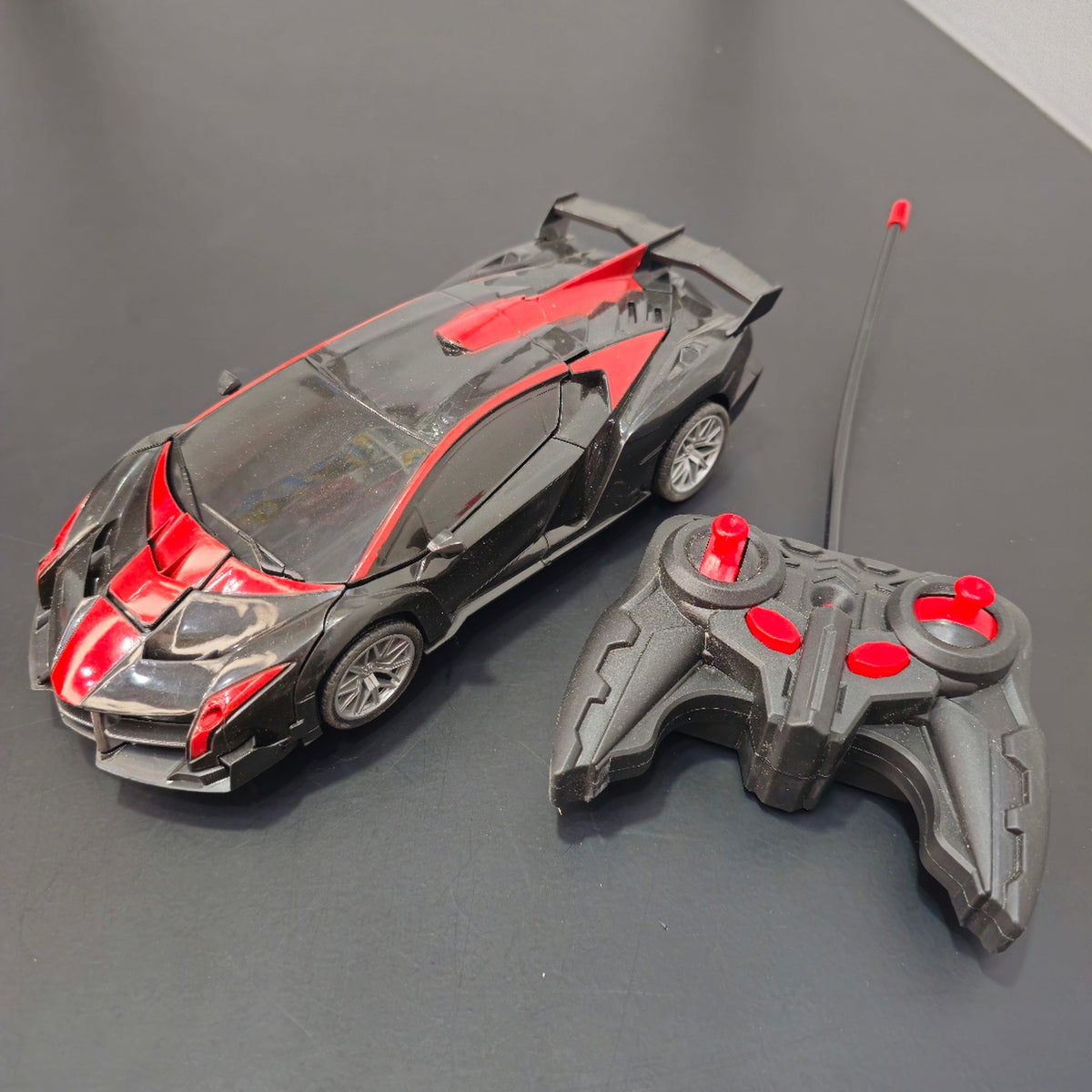 1:18 Scale Power Remote Control Robot Car – Light & Deformation Action